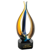 Colorful glass award with a black base on a white background